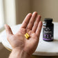 Woman using Leafora synbiotic supplement - daily wellness routine for gut health